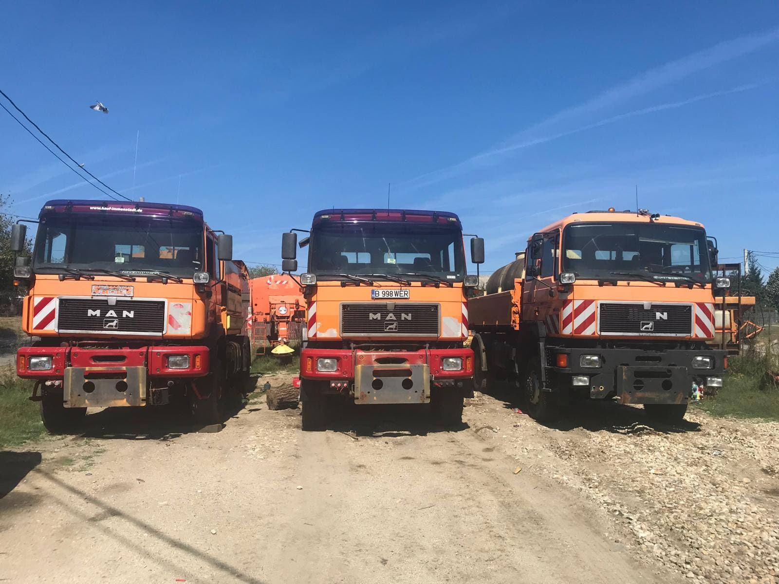 Flotă proprie autobasculante MAN — transport deșeuri construcții Demolex